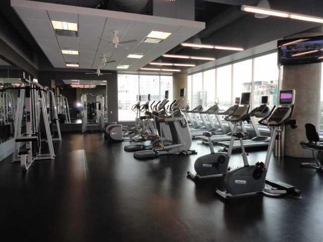 210 Lavaca Street, Unit 1910 Austin, TX 78701 - Photo 34 of 40 a view of a room with gym equipment