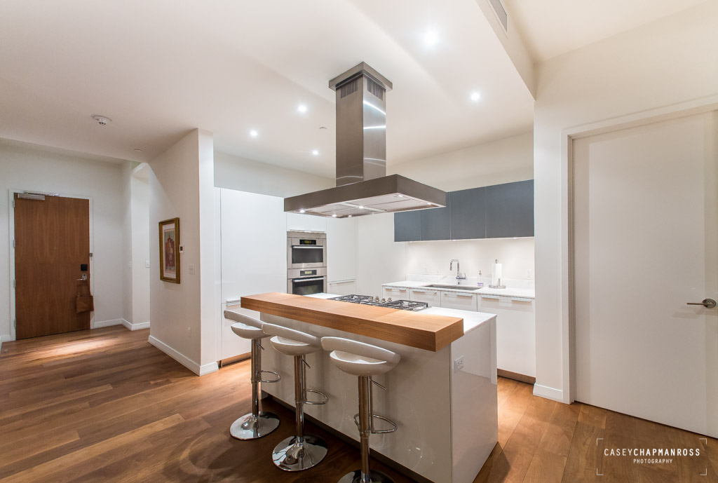 210 Lavaca Street, Unit 1910 Austin, TX 78701 - Photo 9 of 40 a kitchen with stainless steel appliances granite countertop a stove and a refrigerator