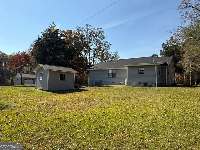a view of an outdoor space with a lake view