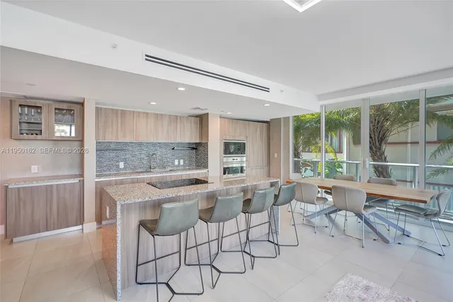 a view of a hallway with washer and dryer