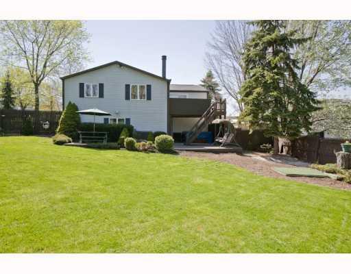 127 Raleigh Court Gibsonia, PA 15044 - Photo 16 of 18 Exterior Back. Backyard with 2 lower level decks, one upper level deck and fishpond!
