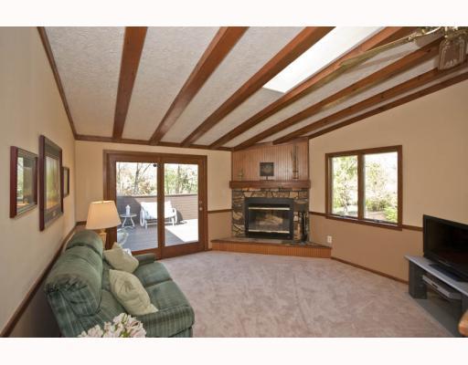 127 Raleigh Court Gibsonia, PA 15044 - Photo 6 of 18 Exterior Front. Family Room with fireplace, vaulted ceilings and lots of natural sunlight leads to upper level deck