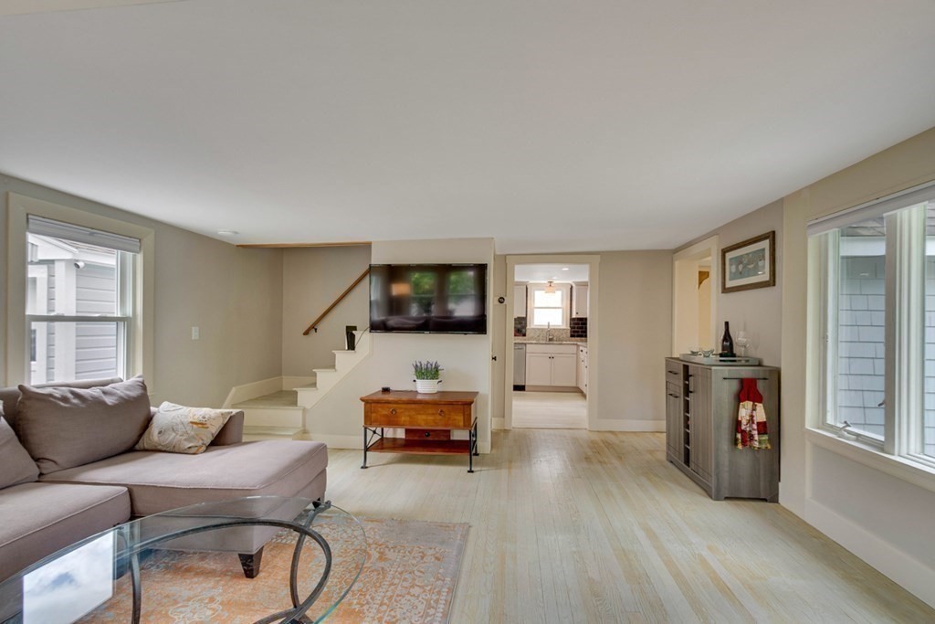 16 Milford Avenue Natick, MA 01760 - Photo 13 of 34 a living room with furniture and a flat screen tv