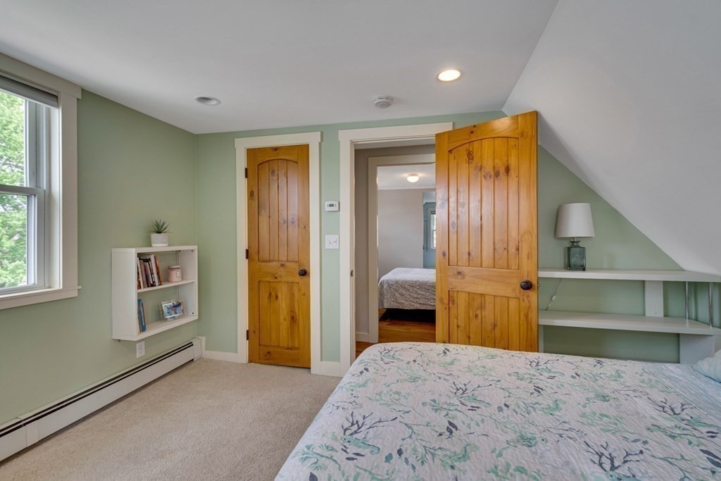 16 Milford Avenue Natick, MA 01760 - Photo 20 of 34 a bedroom with a bed and a window