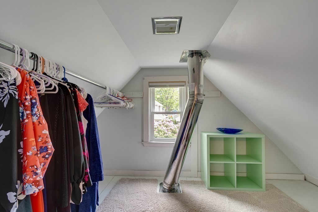 16 Milford Avenue Natick, MA 01760 - Photo 23 of 34 a view of walk in closet with clothes and shoes