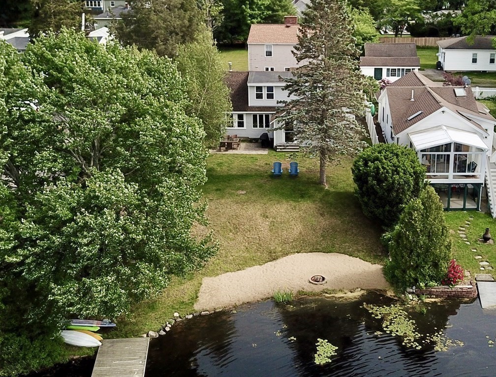 16 Milford Avenue Natick, MA 01760 - Photo 3 of 34 an aerial view of a house with a yard