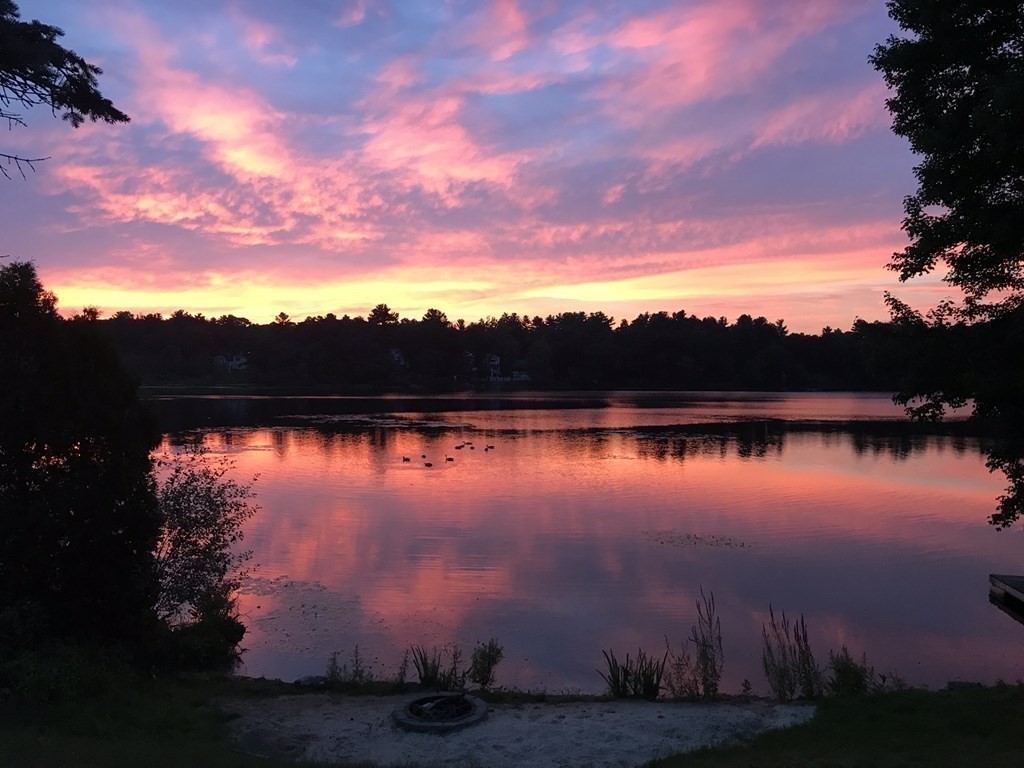 16 Milford Avenue Natick, MA 01760 - Photo 31 of 34 a sunset view with a lake