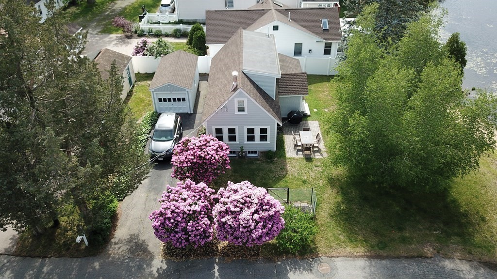 16 Milford Avenue Natick, MA 01760 - Photo 6 of 34 an aerial view of a house with a yard