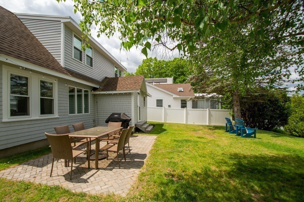 16 Milford Avenue Natick, MA 01760 - Photo 7 of 34 a view of a house with backyard and sitting area