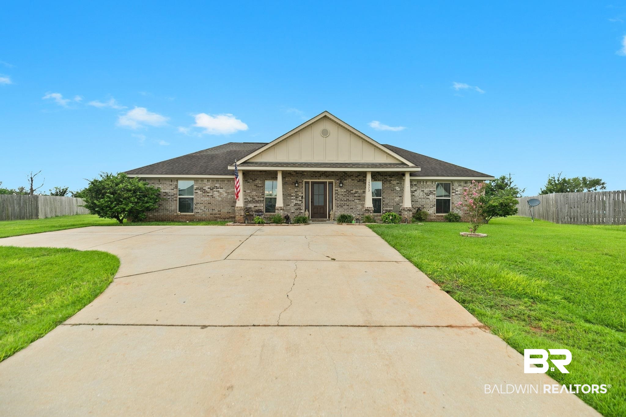 15573 Talus Court Foley, AL 36535 - Photo 3 of 50 View of front facade with a front lawn