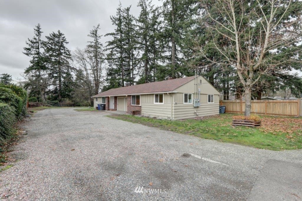 8818 Custer Road Southwest Lakewood, WA 98499 - Photo 10 of 10 a view of a house with yard and garden
