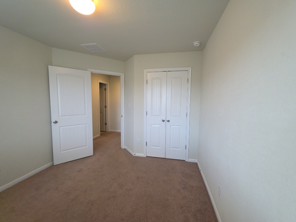 18009 Malnati Drive Pflugerville, TX 78660 - Photo 15 of 22 a view of an empty room