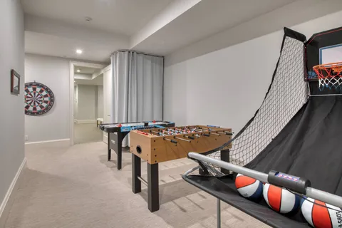 a view of a hallway with seating area
