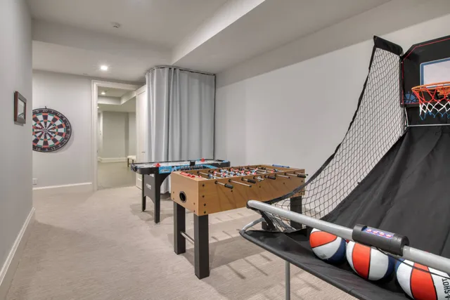 a view of a hallway with seating area