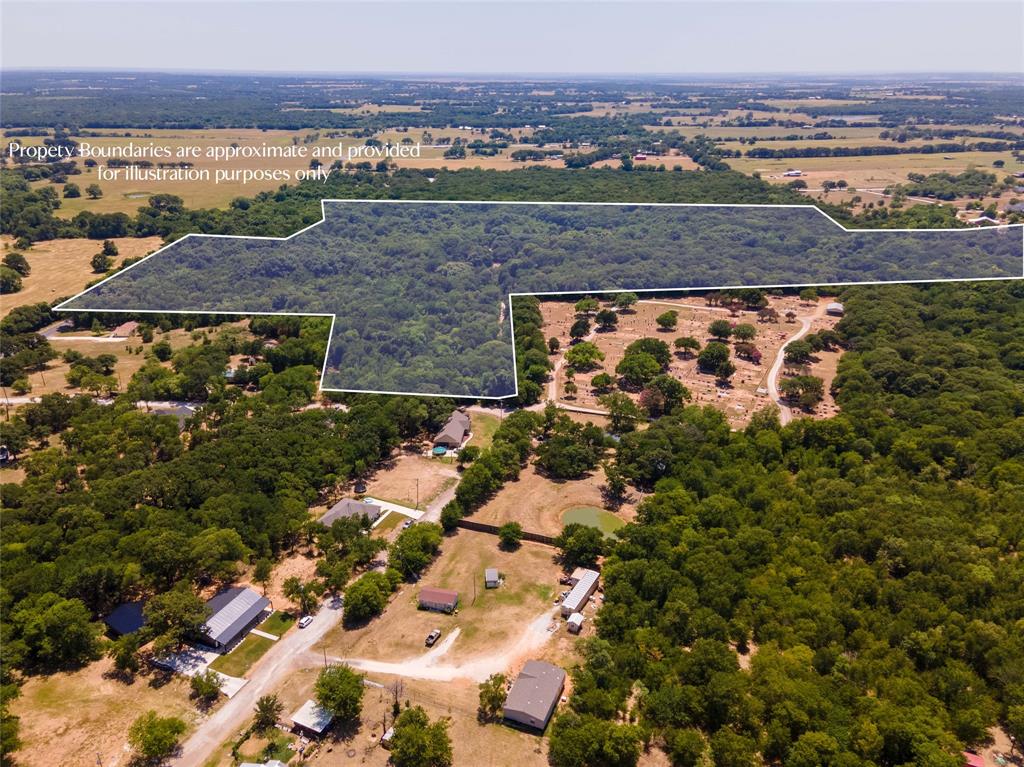 101 Cemetery Road Covington, TX 76636 - Photo 1 of 1 a view of a city