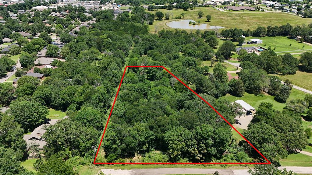 Tbd Ripplewood Drive Paris, TX 75462 - Photo 2 of 6 an aerial view of residential houses with outdoor space and trees