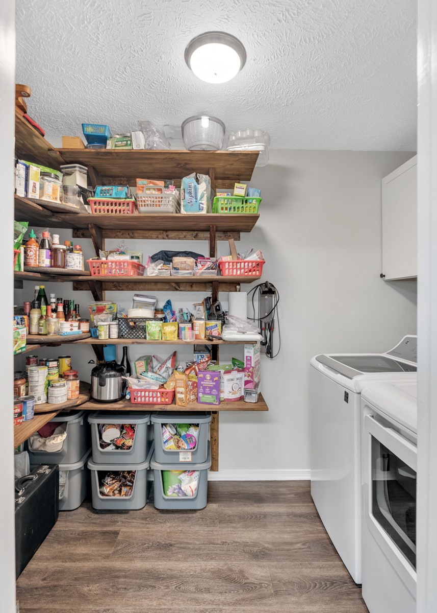 7226 Hidden Lake Drive Fairview, TN 37062 - Photo 19 of 54 a view of kitchen with food items with wooden floor