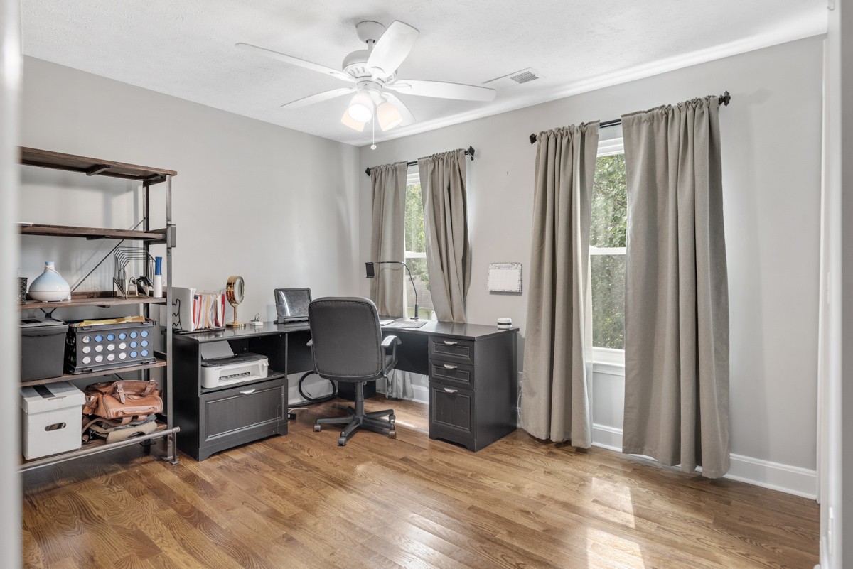 7226 Hidden Lake Drive Fairview, TN 37062 - Photo 29 of 54 a view of a workspace with furniture and a window
