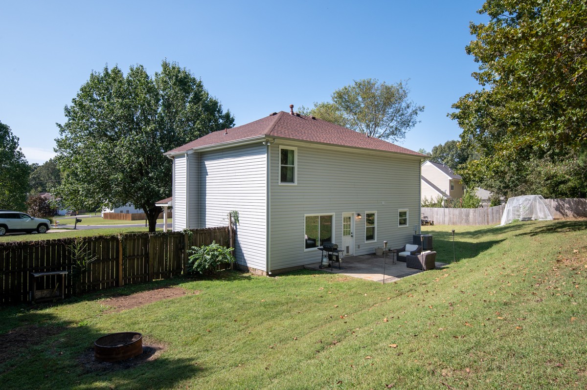 7226 Hidden Lake Drive Fairview, TN 37062 - Photo 34 of 54 a front view of a house with garden