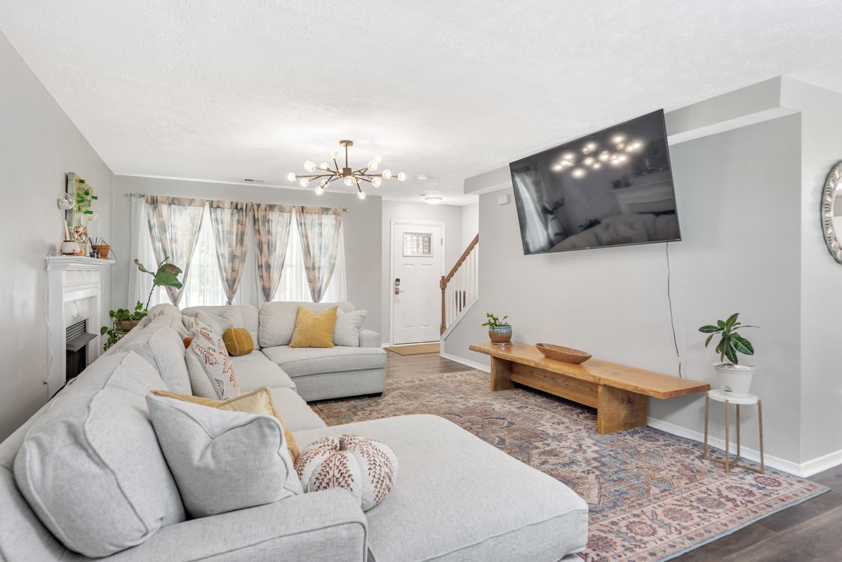 7226 Hidden Lake Drive Fairview, TN 37062 - Photo 7 of 54 a living room with furniture and a flat screen tv