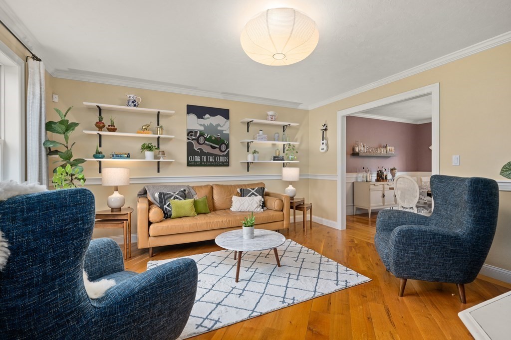 4 Mentas Circle Woburn, MA 01801 - Photo 11 of 41 a living room with furniture and a wooden floor