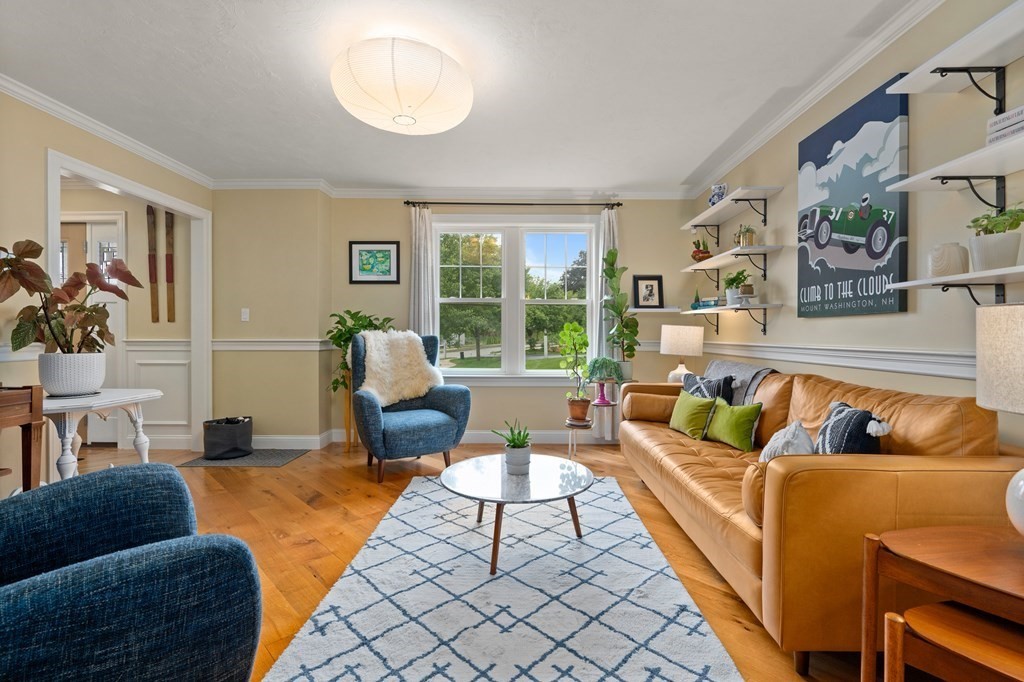 4 Mentas Circle Woburn, MA 01801 - Photo 12 of 41 a living room with furniture and a large window