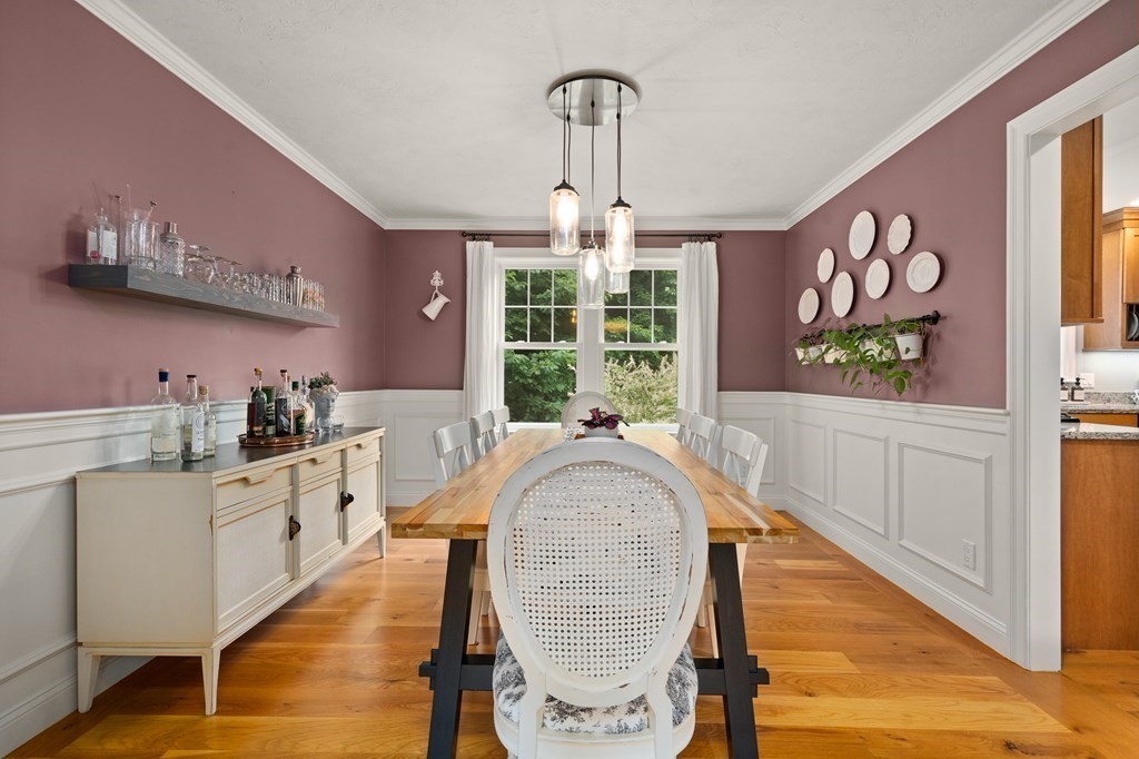 4 Mentas Circle Woburn, MA 01801 - Photo 13 of 41 a kitchen with stainless steel appliances granite countertop a stove and cabinets