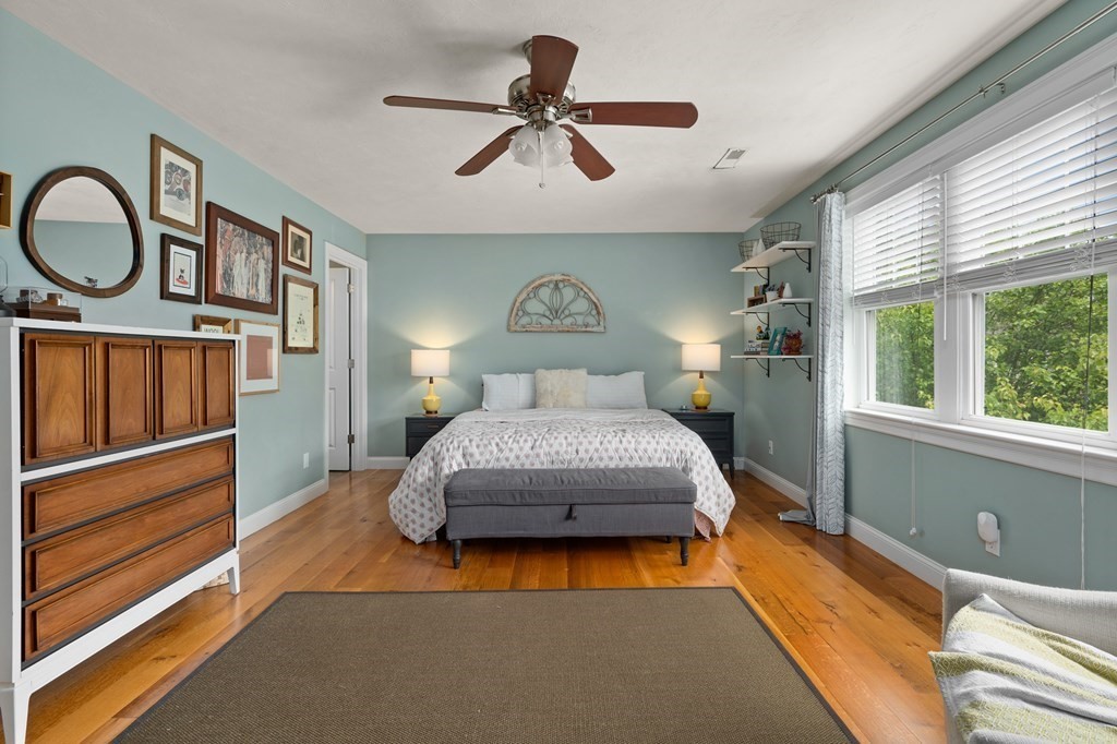 4 Mentas Circle Woburn, MA 01801 - Photo 17 of 41 a bedroom with a bed a dresser and window
