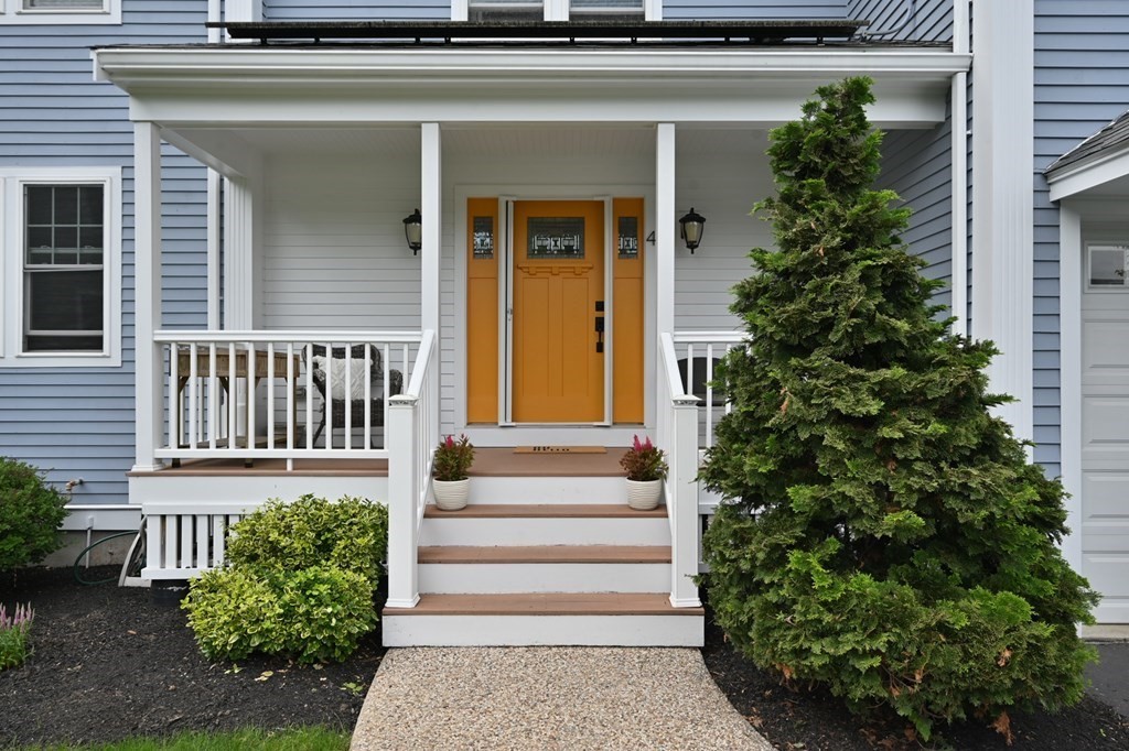 4 Mentas Circle Woburn, MA 01801 - Photo 2 of 41 a front view of a house with plants