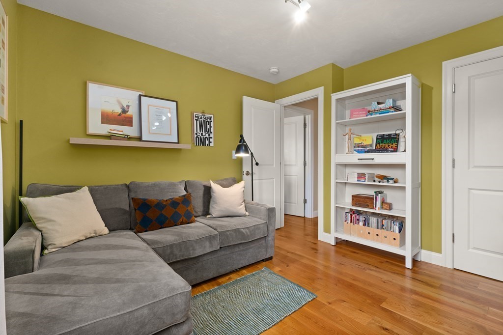 4 Mentas Circle Woburn, MA 01801 - Photo 26 of 41 a living room with furniture and painting on the wall