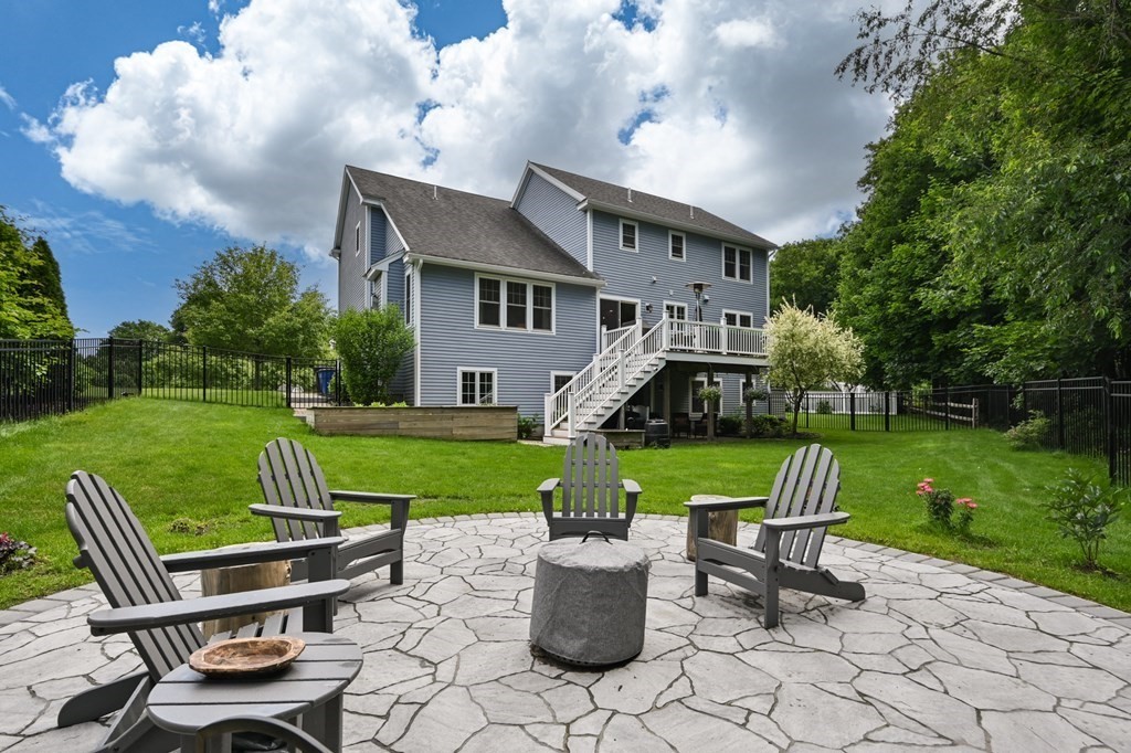 4 Mentas Circle Woburn, MA 01801 - Photo 40 of 41 a view of a table and chairs in the garden