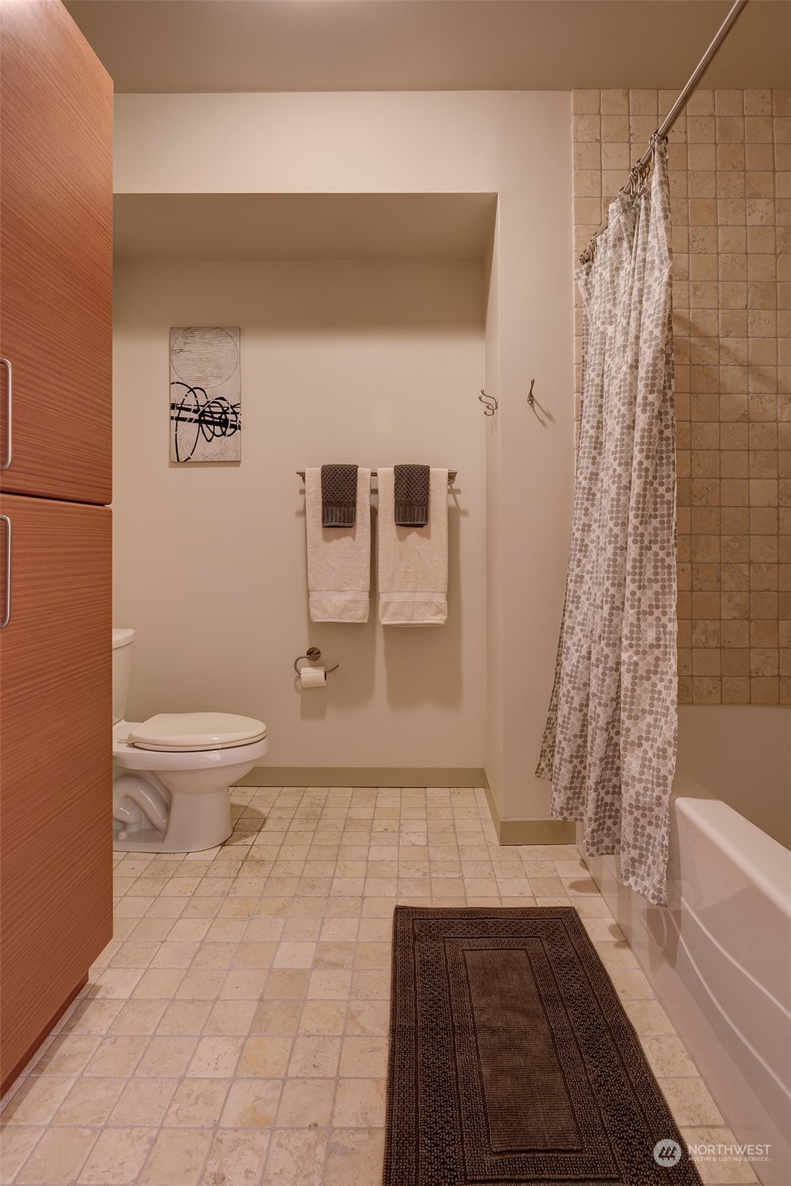 1530 Northwest Market Street, Unit 812 Seattle, WA 98107 - Photo 15 of 34 a bathroom with a toilet and a shower