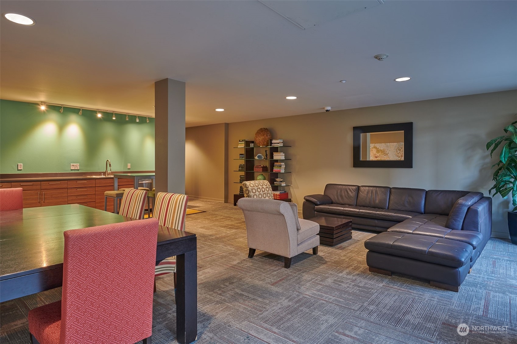 1530 Northwest Market Street, Unit 812 Seattle, WA 98107 - Photo 23 of 34 a living room with furniture and painting on the wall
