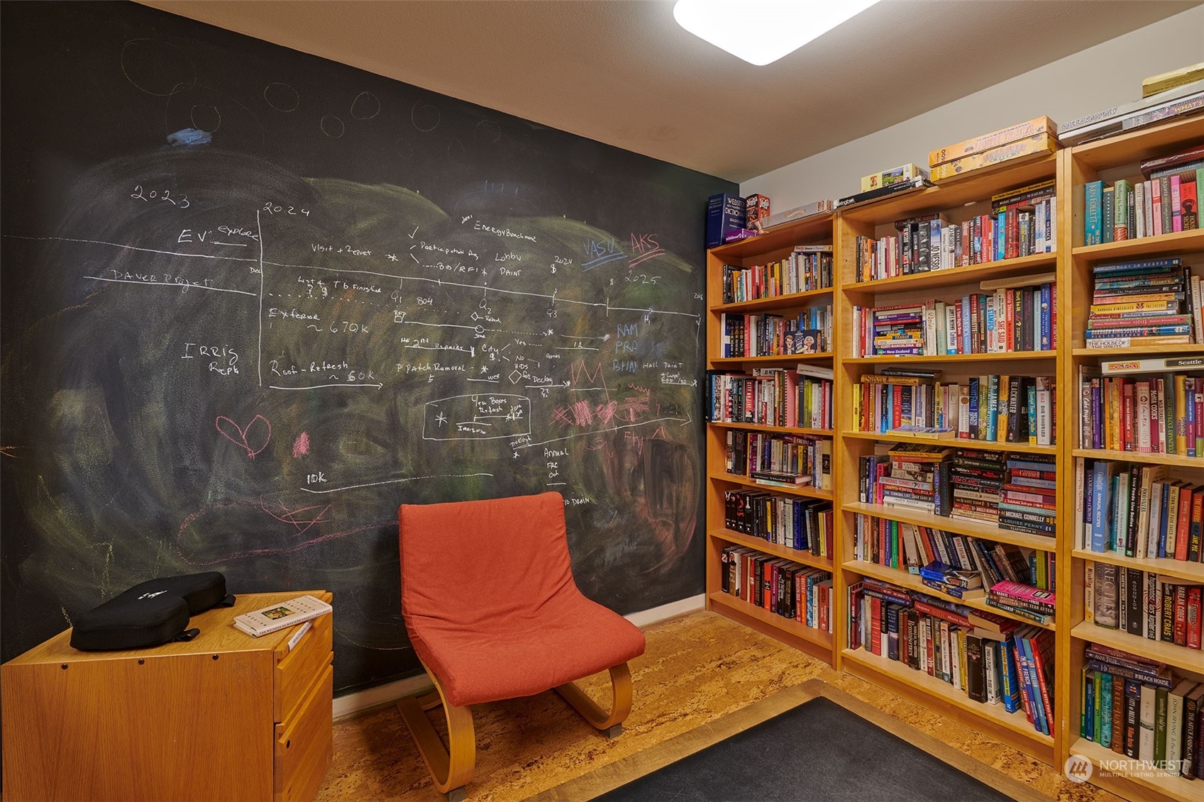1530 Northwest Market Street, Unit 812 Seattle, WA 98107 - Photo 27 of 34 a book shelf with a book shelf and a book shelf