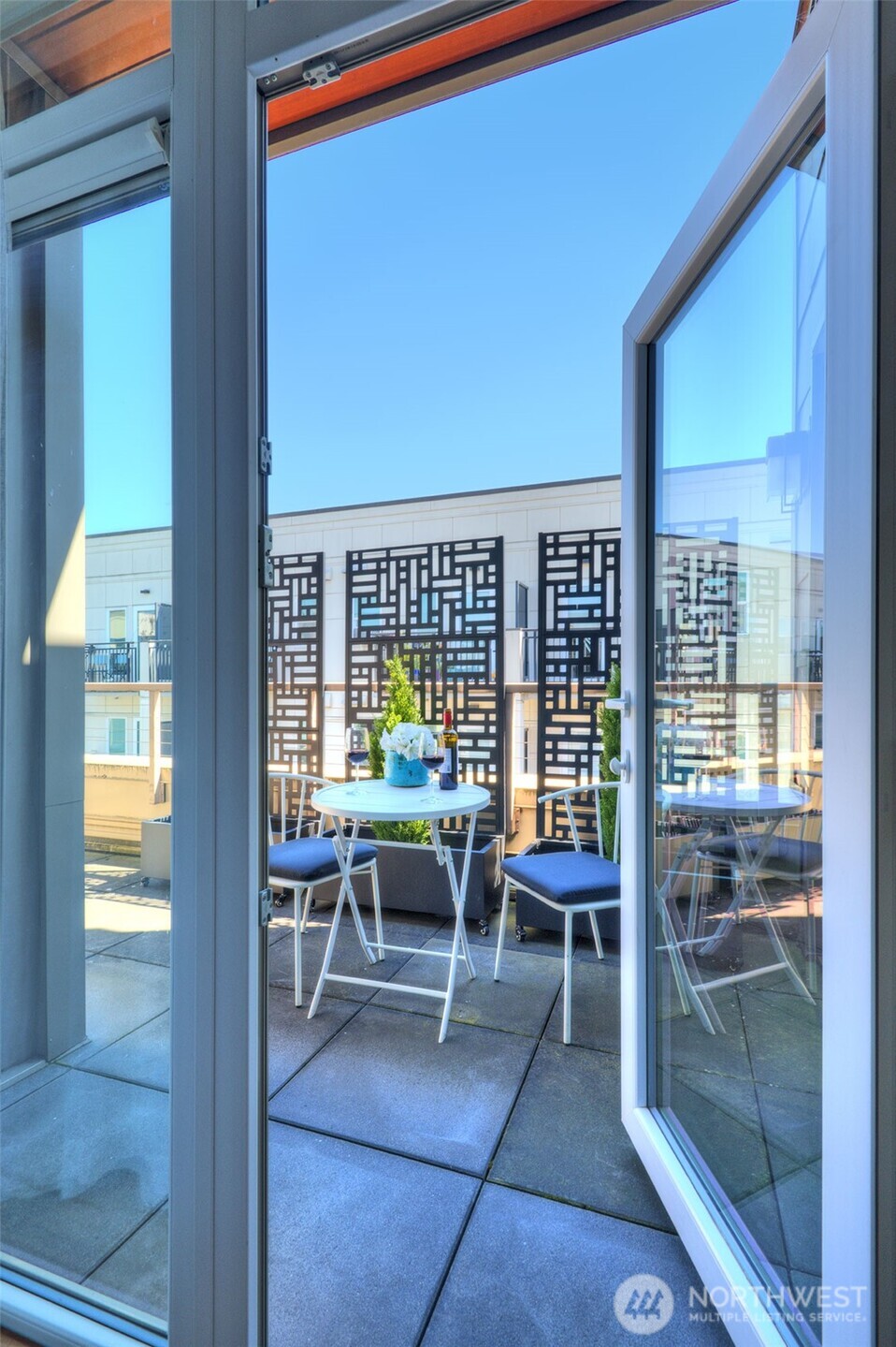 1530 Northwest Market Street, Unit 812 Seattle, WA 98107 - Photo 8 of 34 a outdoor space with chairs