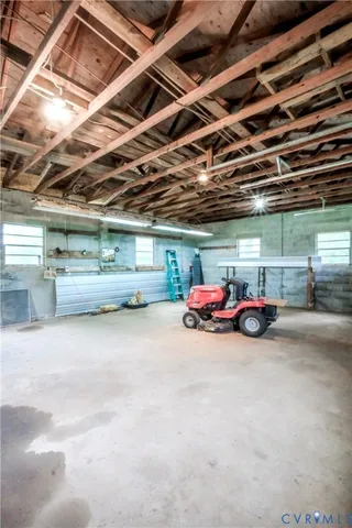 a view of parking garage with cars
