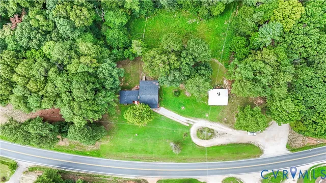 a view of a garden from a balcony