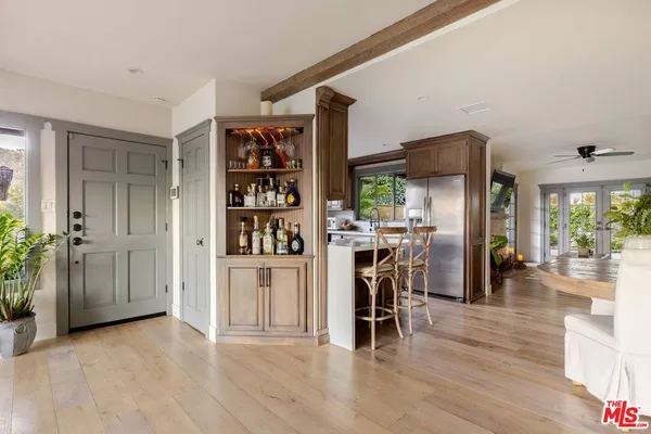 a view of a living room and dining room