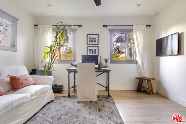 a view of livingroom with furniture and wooden floor