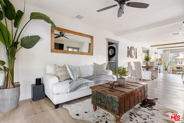 a living room with furniture and a couch