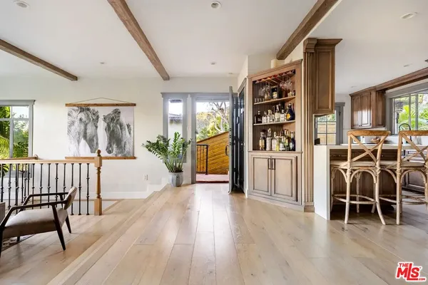a view of a livingroom with furniture and wooden floor