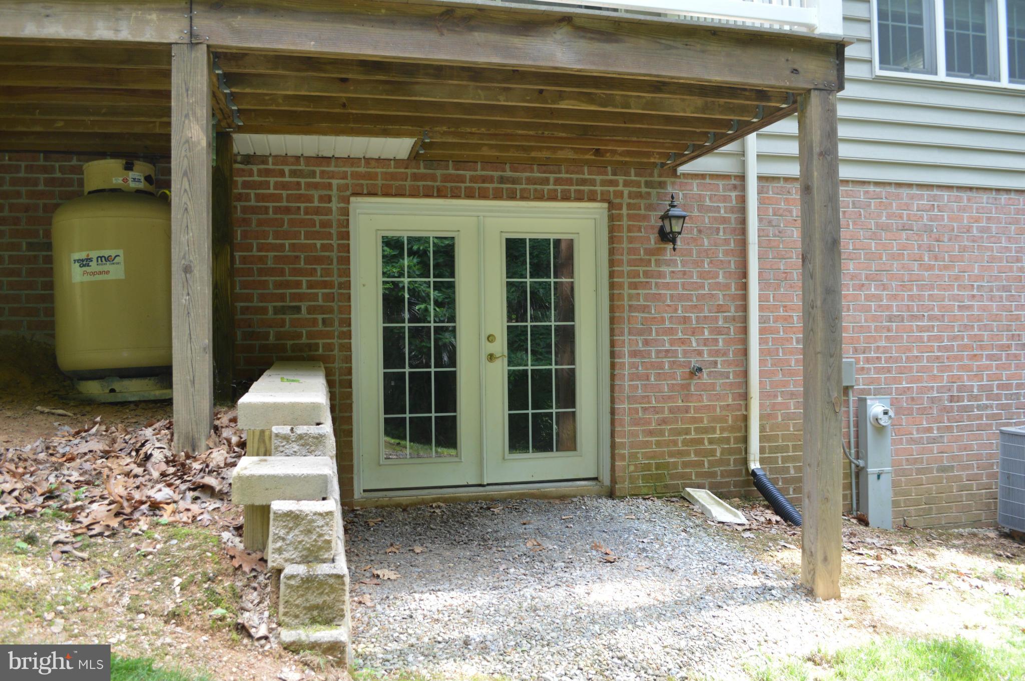 2015 Hughes Shop Road Westminster, MD 21158 - Photo 29 of 30 French doors lead into the basement with windows