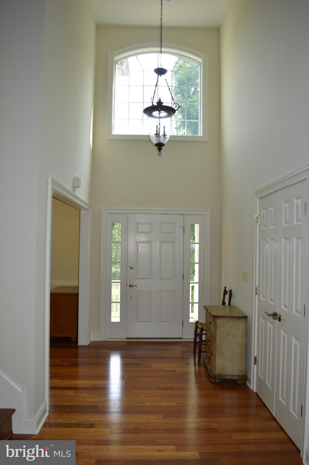 2015 Hughes Shop Road Westminster, MD 21158 - Photo 5 of 30 Hallway looking at front door and two story foyer
