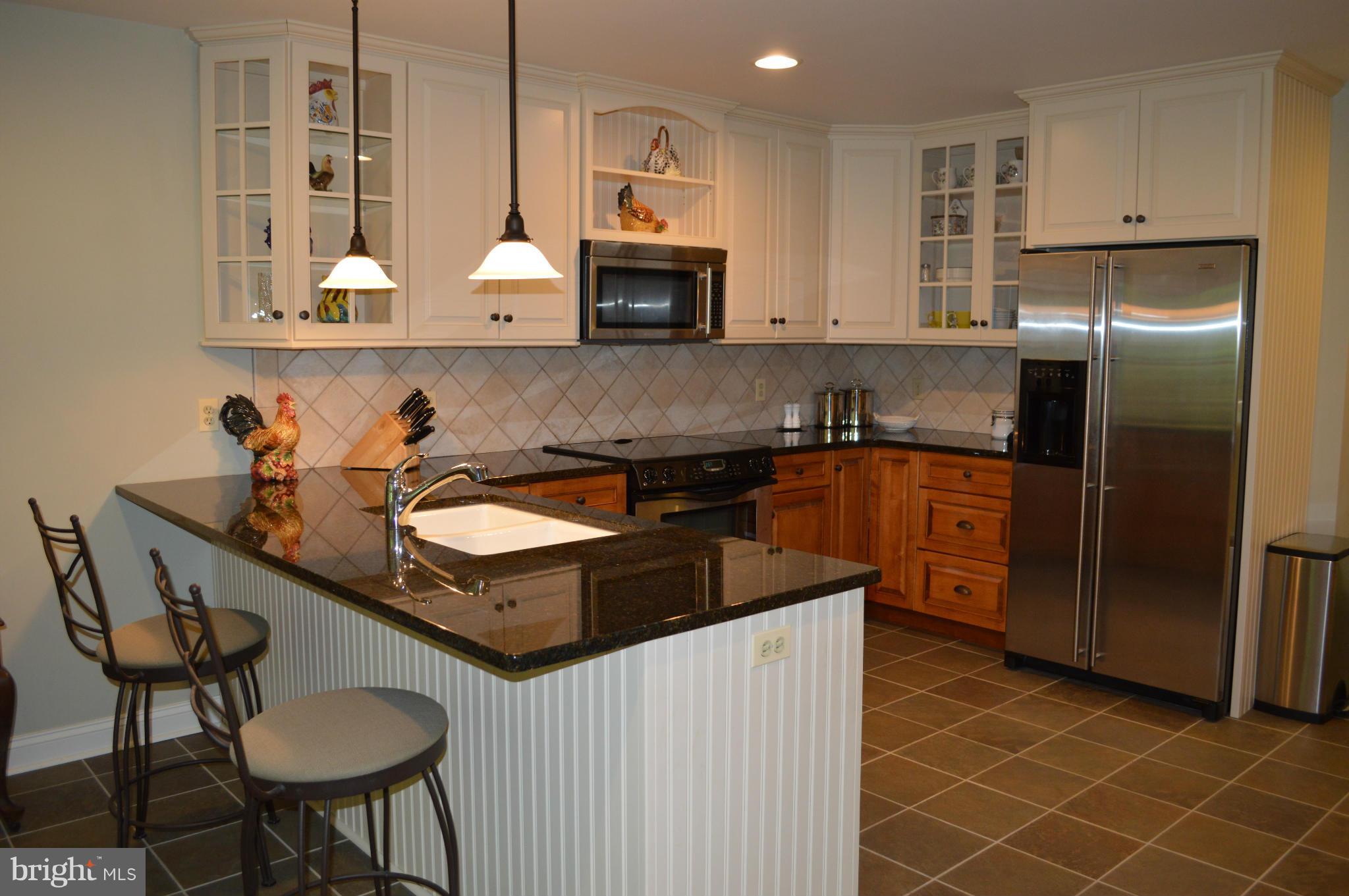 2015 Hughes Shop Road Westminster, MD 21158 - Photo 9 of 30 Custome built cabinets, porcelain flr, stainless
