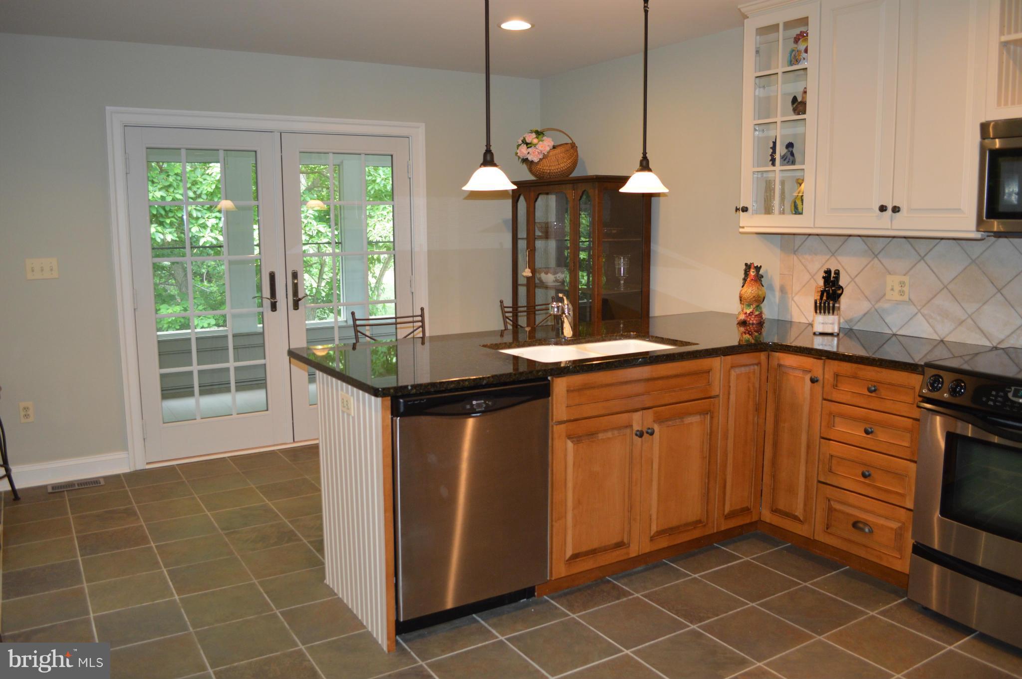 2015 Hughes Shop Road Westminster, MD 21158 - Photo 10 of 30 Peninsula, granite countertops and bltin cabinet