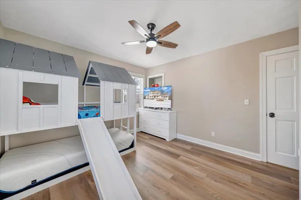a view of a porch with wooden floor