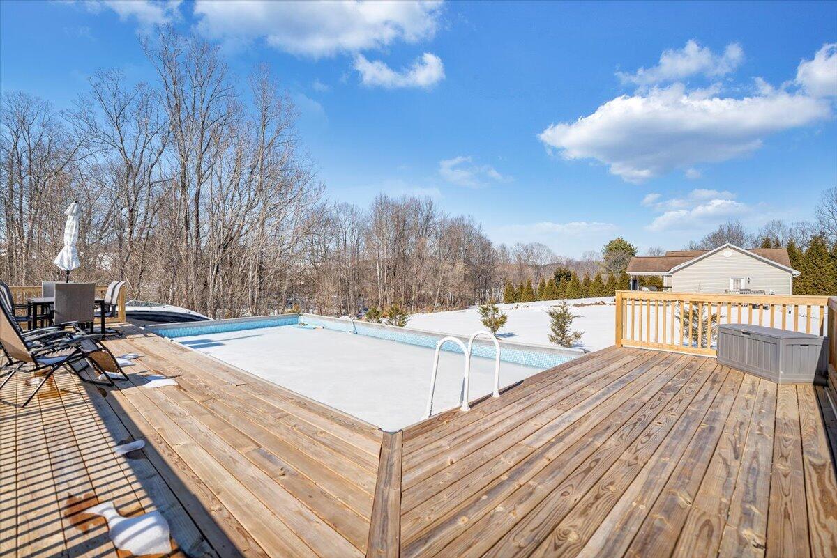 10 Wilkerson Road Wirtz, VA 24184 - Photo 83 of 89 a view of roof deck with a barbeque and wooden stairs