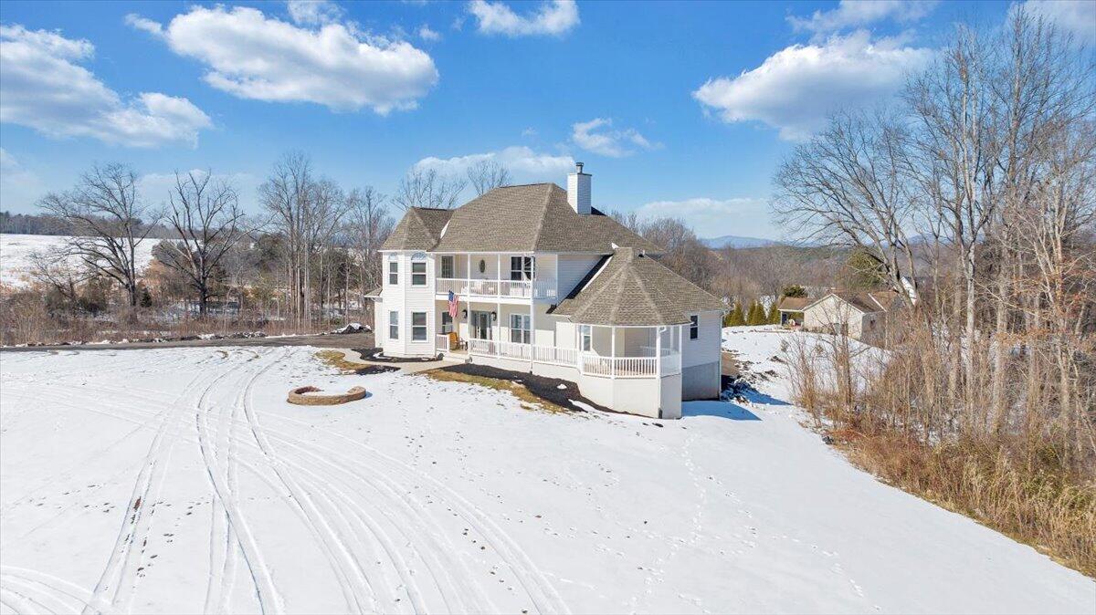 10 Wilkerson Road Wirtz, VA 24184 - Photo 89 of 89 a view of a house with a snow in a yard