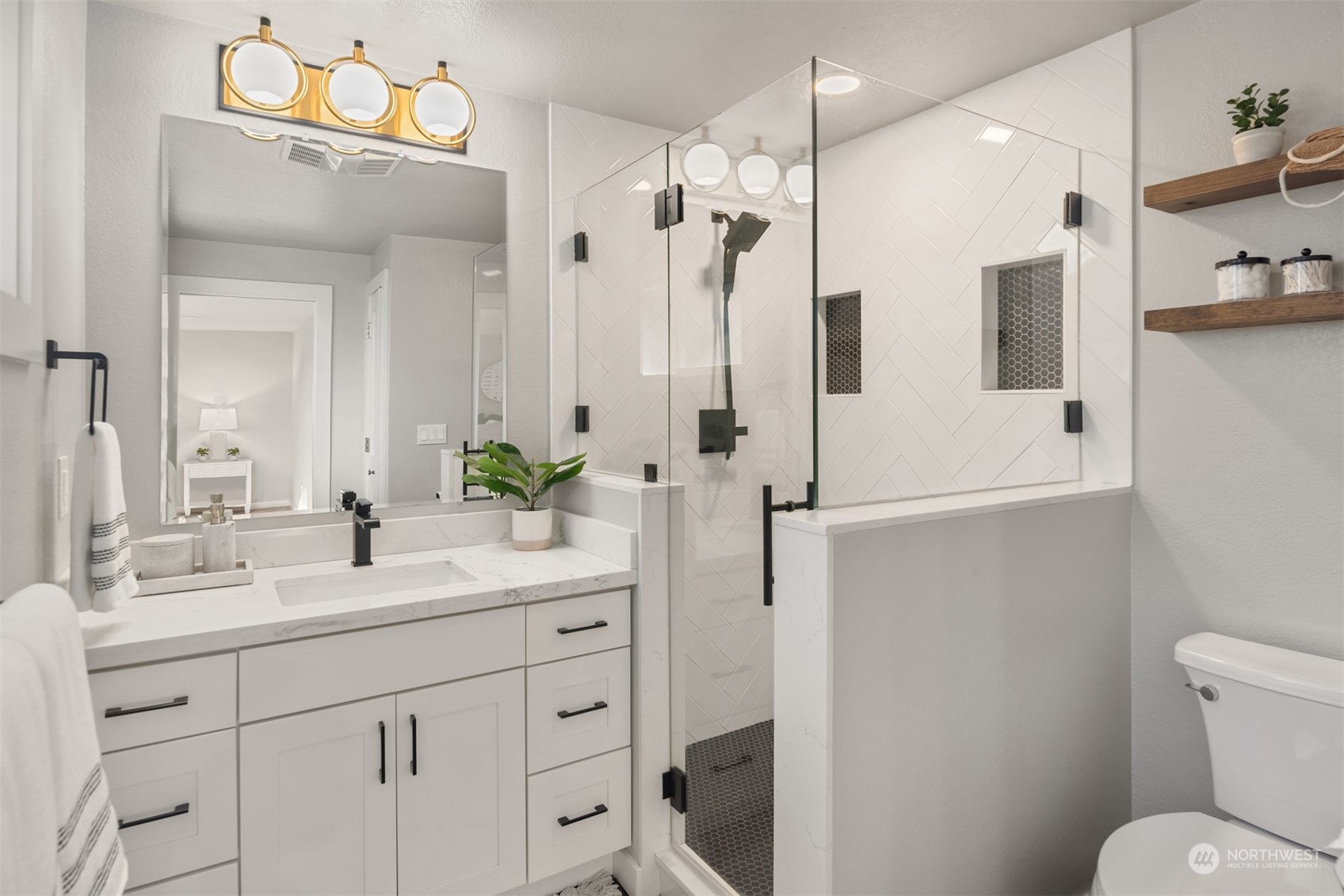 917 9th Avenue South Edmonds, WA 98020 - Photo 18 of 40 a bathroom with a sink a toilet and shower