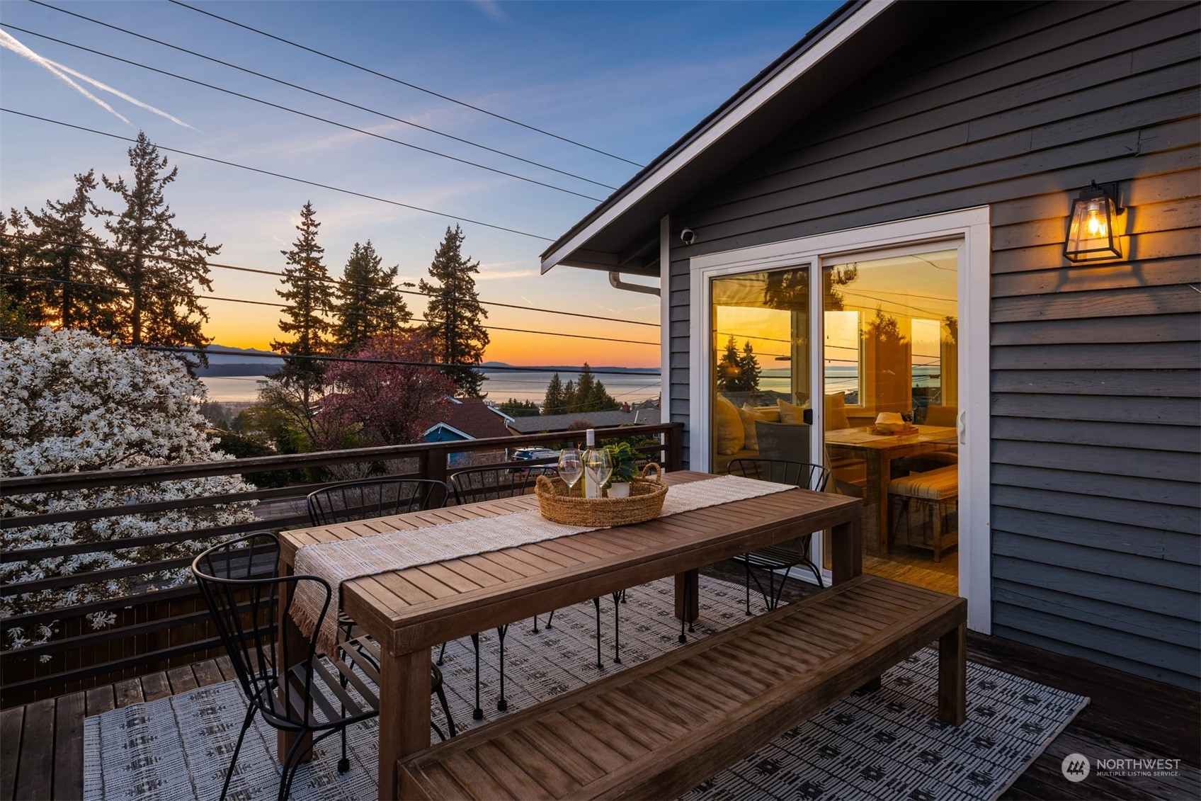917 9th Avenue South Edmonds, WA 98020 - Photo 2 of 40 a view of a patio with a table chairs and a table